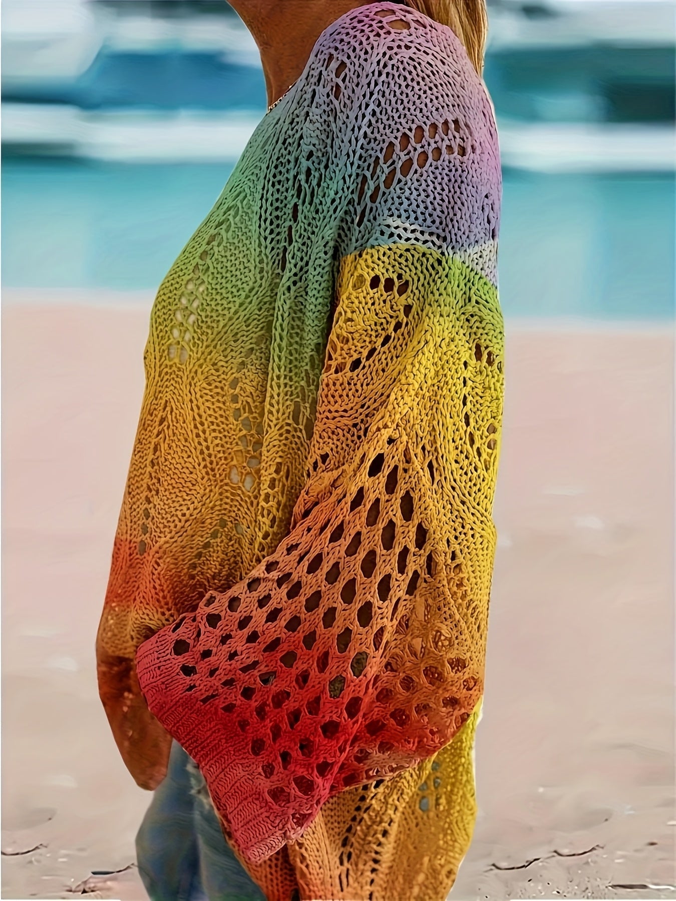 Regenboogkleurige gebreide trui